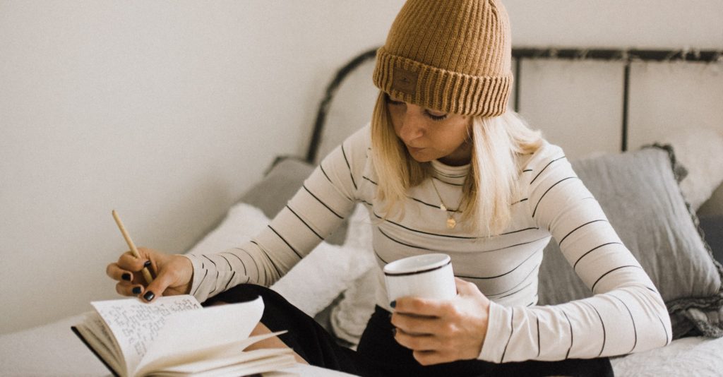 Young Woman Studying English Phrases