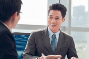 Asian man in an internal job interview